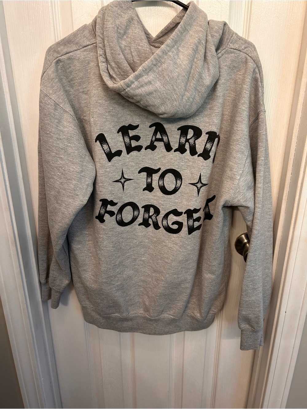 Gray Graphic Hooded Sweatshirt with "Learn to Forget" Back Print
